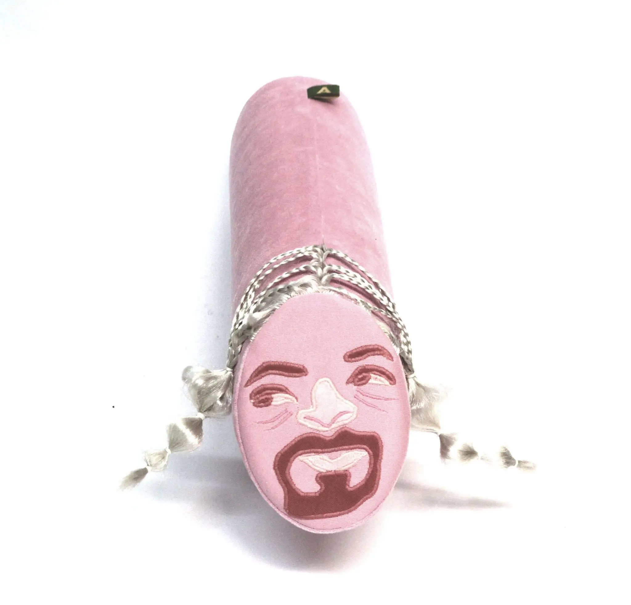 Das Gesichts-Wurstkissen ist eine witzige Geschenkidee. Ein Kissen, das aussieht wie eine Wurst bekommt an der Schnittseite anhand einer Fotovorlage ein Gesicht eingearbeitet.