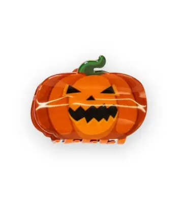 Haarclip Kürbis von vorne: orange Haarklammer mit geschnitztem Halloween-Gesicht und grünem Stiel